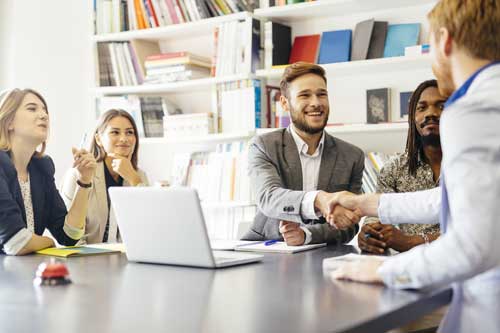 Business partners shaking hands