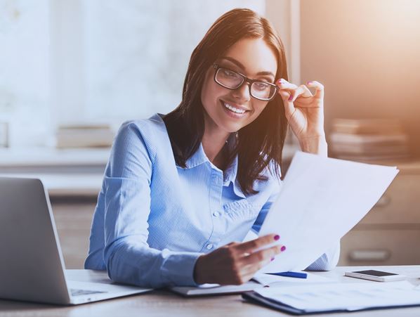 Customer Service Manager reading document