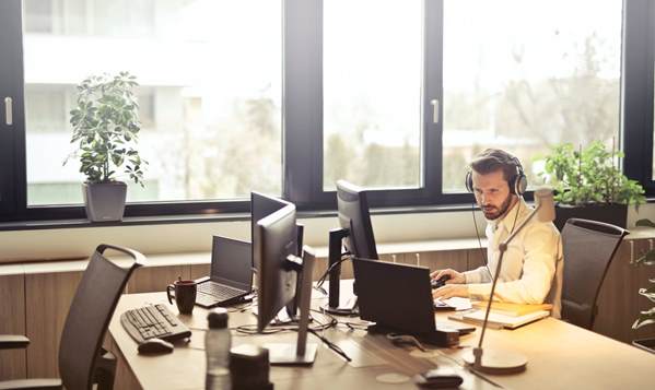 man working at office desk