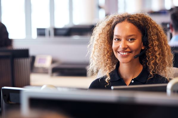 Contact center agent wearing headset