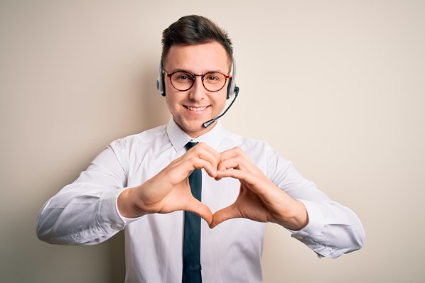 Customer Care Agent showing heart sign