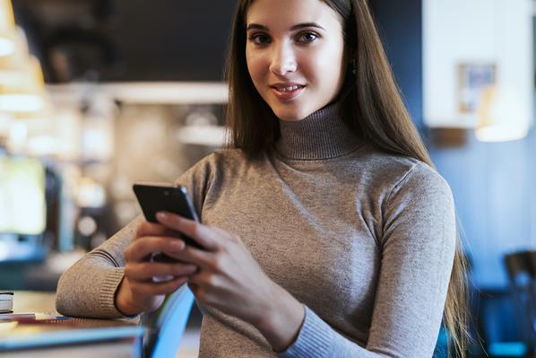 Customer using app on her phone