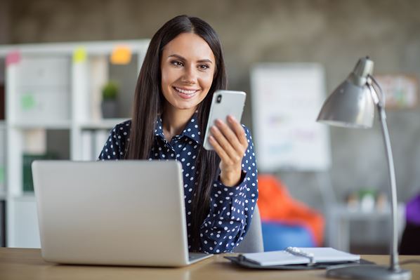 Small business owner viewing her website