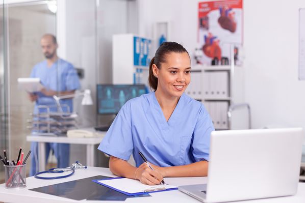 Nurse using patient portal software 