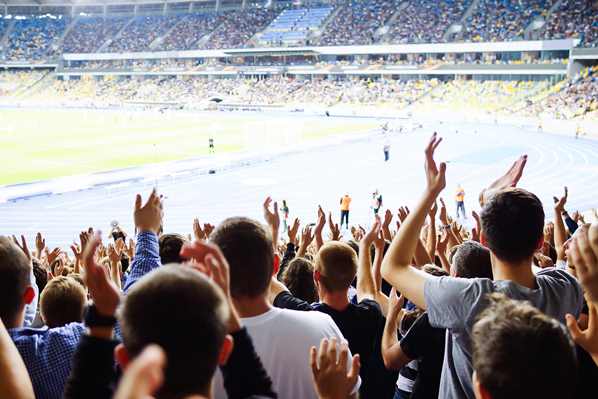 Australian NRL fans clapping in stadium