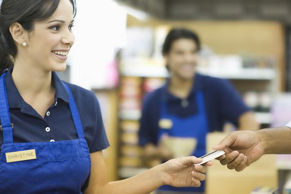 Customer paying with credit card in store