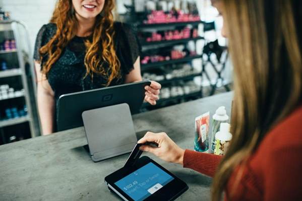 Customer paying electronically in store