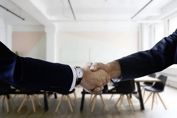 Business people shaking hands