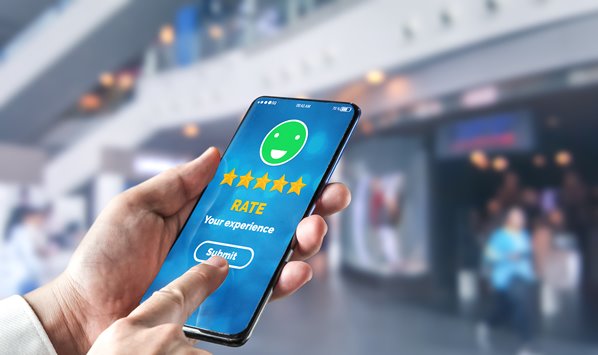 Customer giving a review on mobile phone