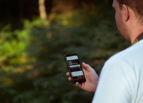 Man looking at mobile phone