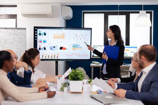 Team leader gives business presentation