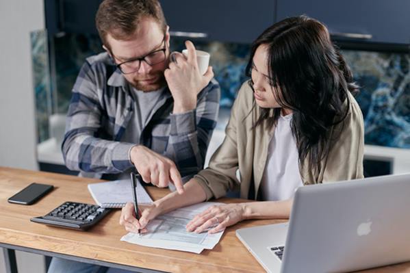 Business people issuing invoices to customers