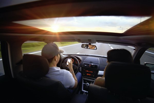 Couple driving in car