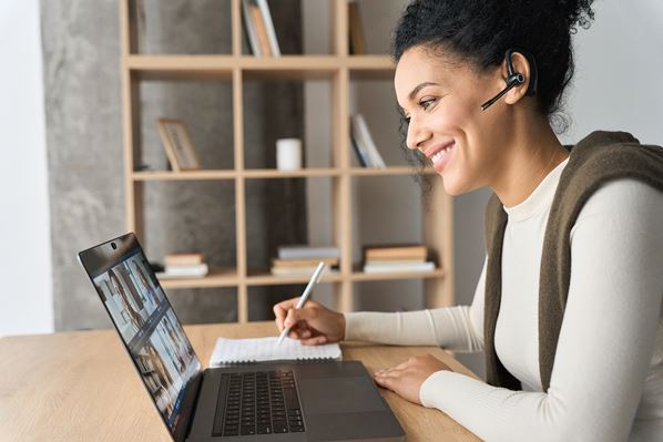 Remote worker using video call on computer