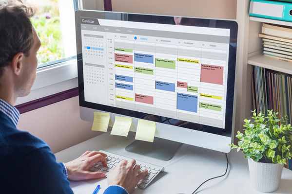 Employee using productivity app on his computer