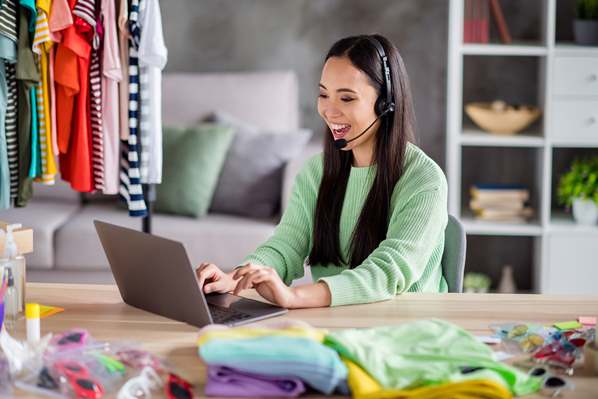 Retail store manager speaking to customers online