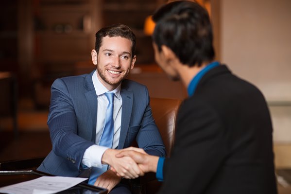 New customer shaking hands