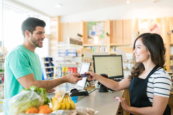 Customer paying for goods in a store