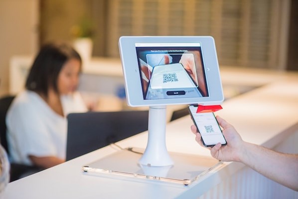 Customer scanning QR code on smartphone