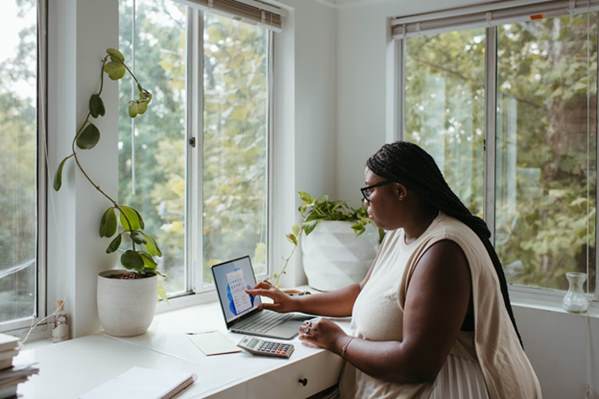 Women working at home on her computer