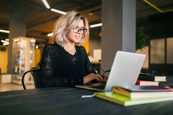 Marketing student working on laptop