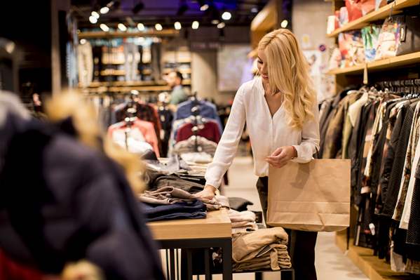 Women shopping in clothes store