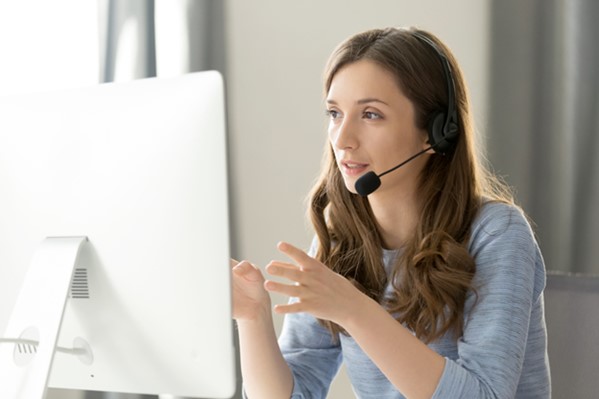 Contact center assistant wearing phone headset