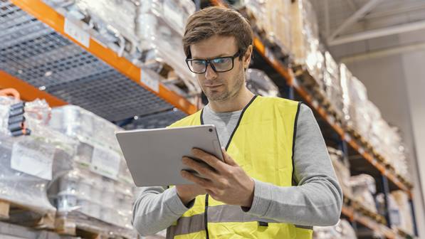 Inventory manager using  tablet in warehouse