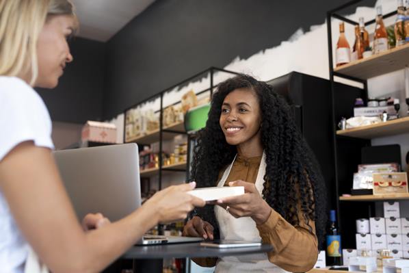 Customer in store buying a product