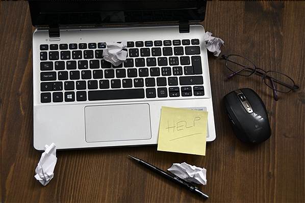 Laptop with post-it notes