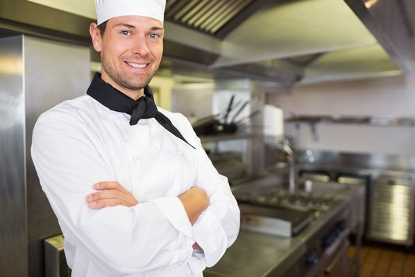 Smiling chef in kitchen