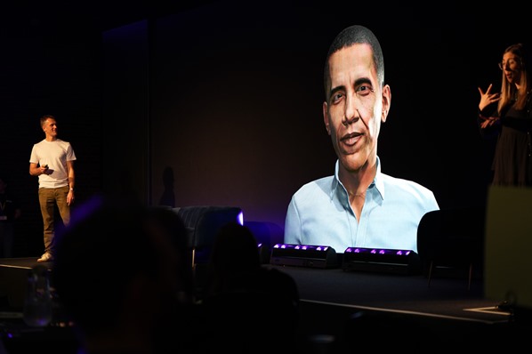 Sabio's Chief Innovation Officer, Stuart Dorman with AI-generated, Barack Obama 