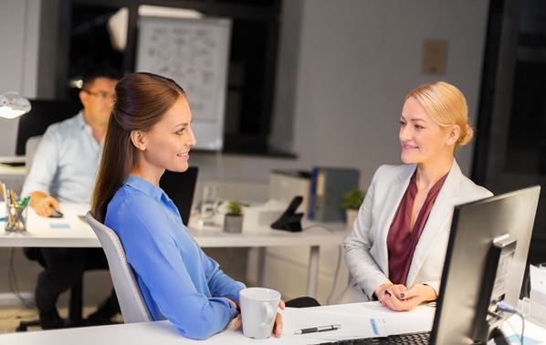 Manager listening supportively to team member