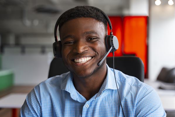 Smiling customer support agent