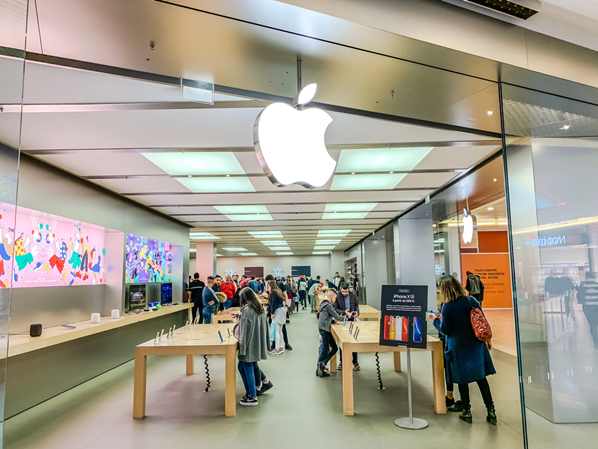 Customers shopping in an Apple store